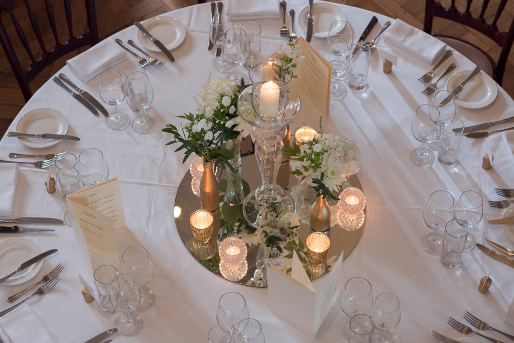 Mirror plate with flowers and candles