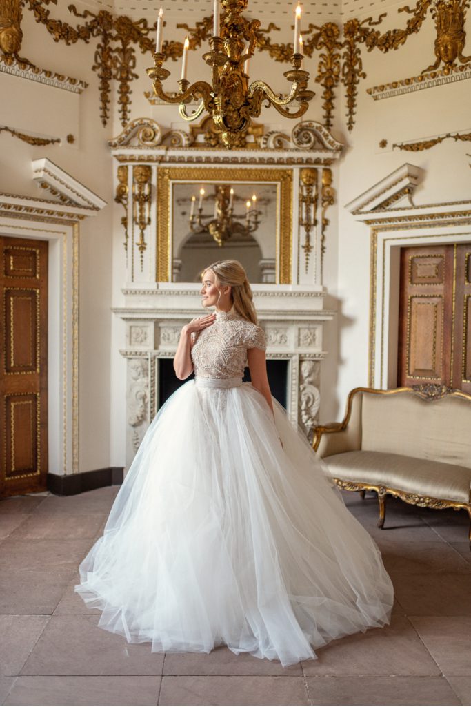 Bride wearing lace and tulle ballgown wedding dress at Chiswick House