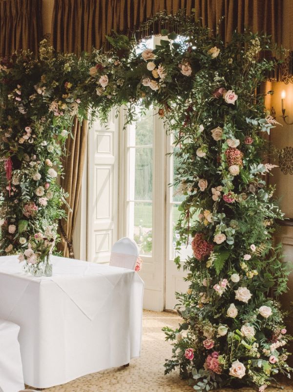 Flower arch wedding ceremony backdrop