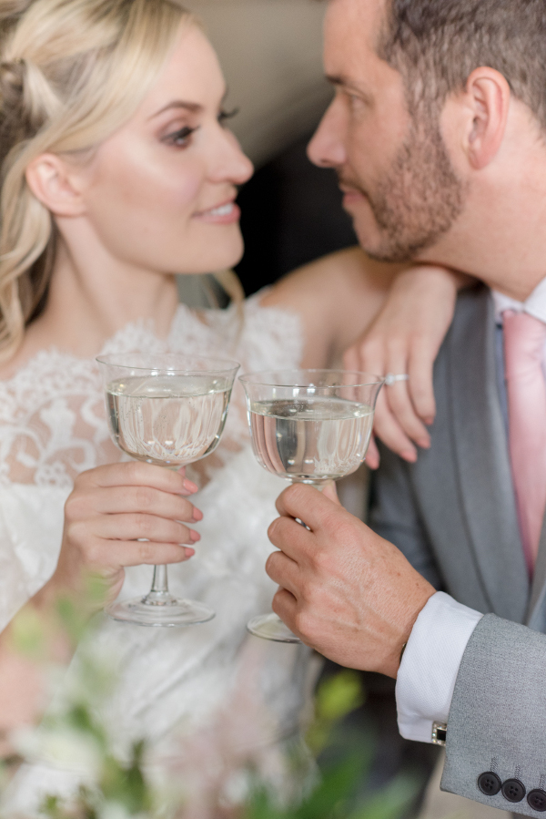 Toasting wedding couple Wotton House