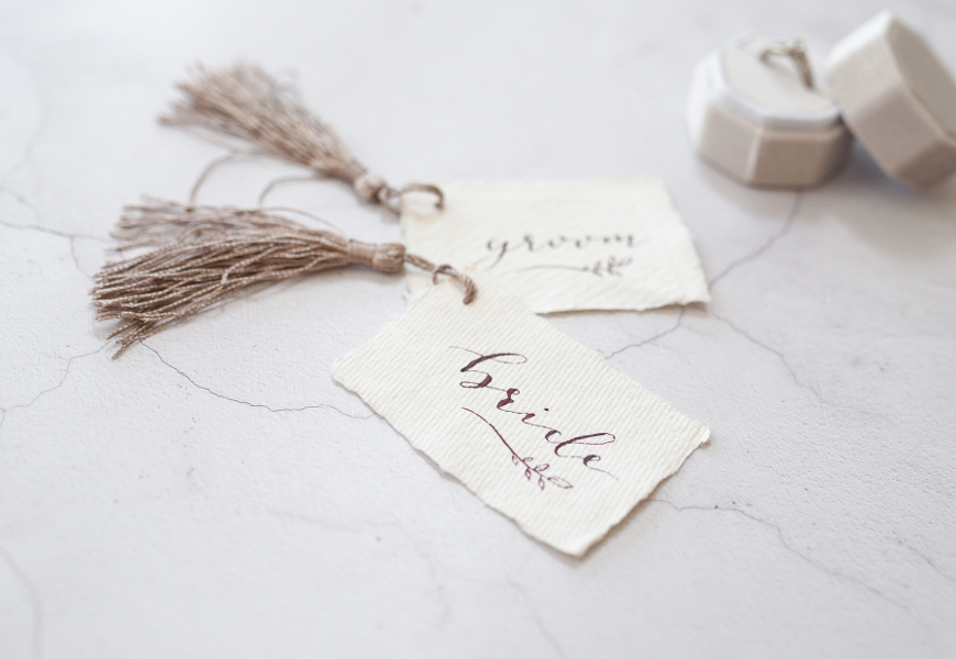 Calligraphied place card  on deckled edge paper with tassel