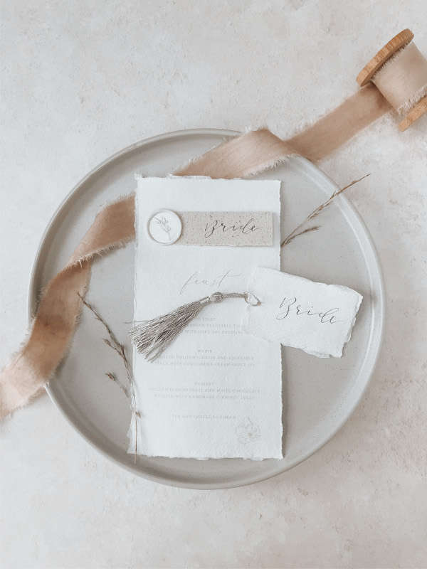 Deckled edge menu and place card with wax seal
