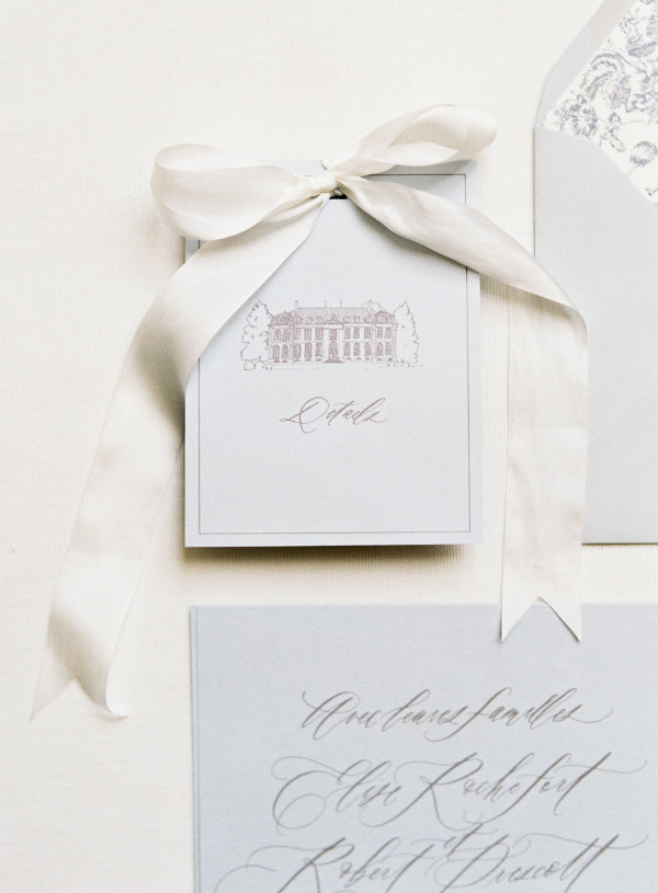 Wedding invitations with hand drawn illustration of wedding venue