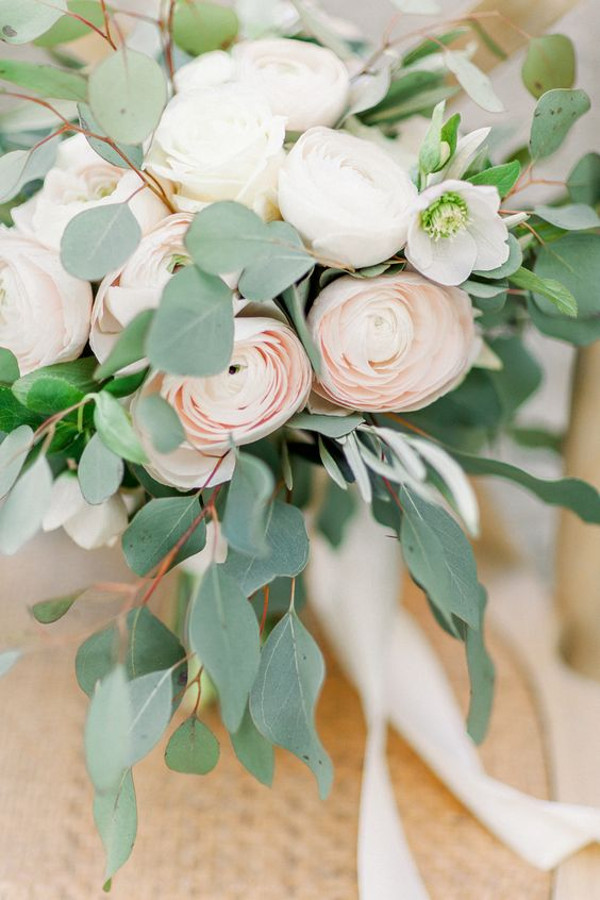 Unstructured wedding bouquet with peonies and roses