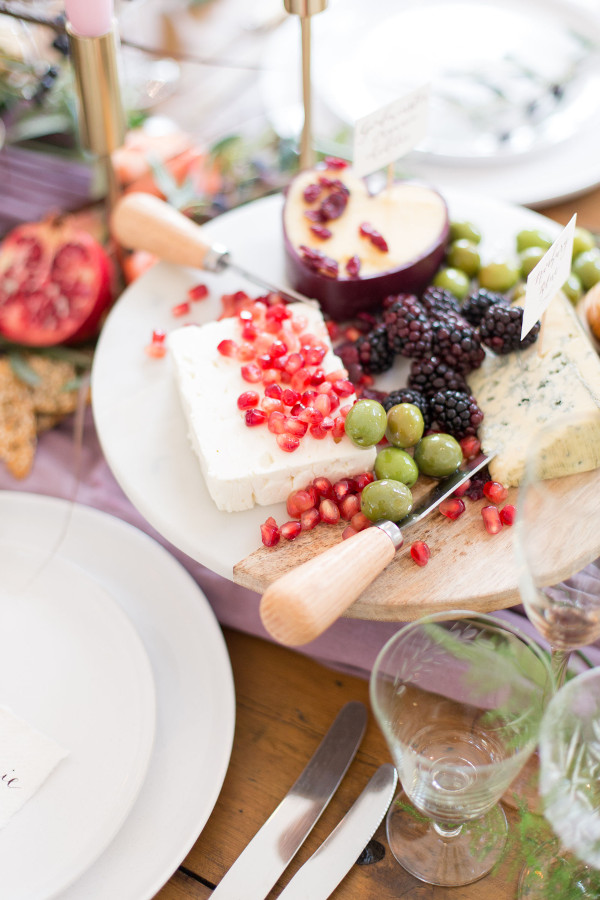 Grazing table with cheeses and fruits