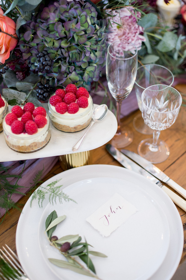 Individual desserts as part of grazing table at wedding reception