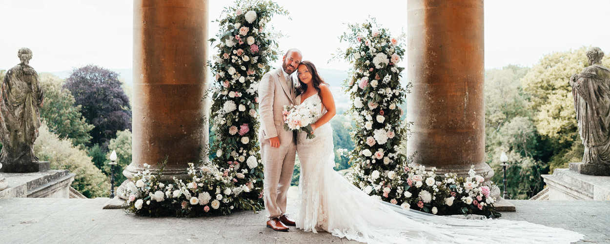 Bath wedding floral arch installation bride and groom