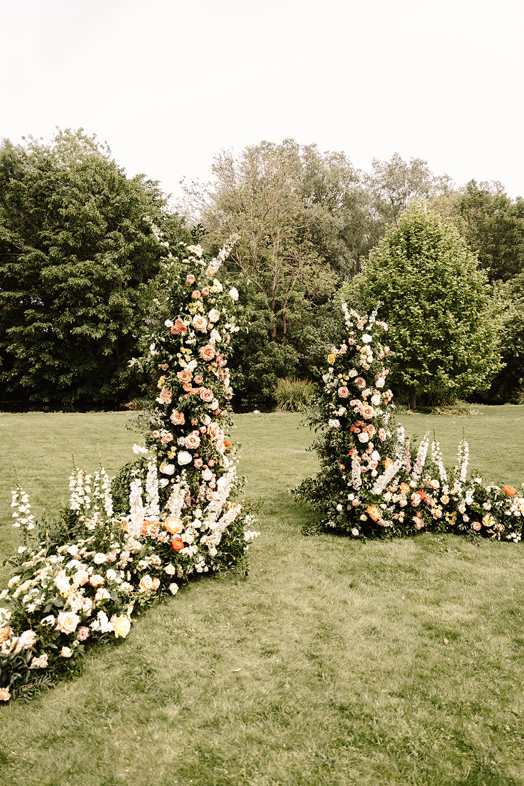 Semi circle floral installation for ceremony backdrop