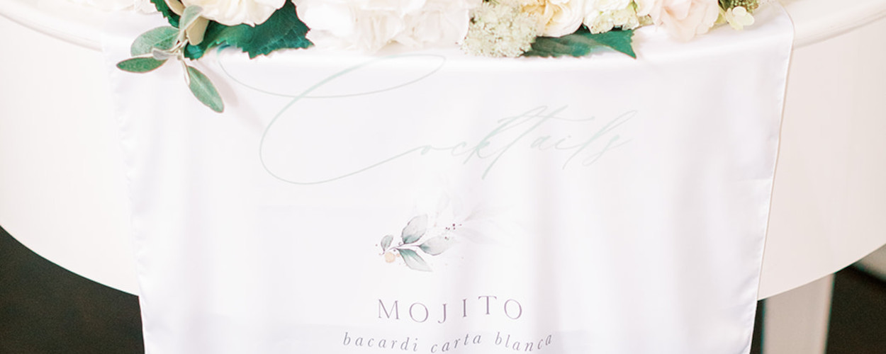 Bar sign written in calligrpahy on silk fabric