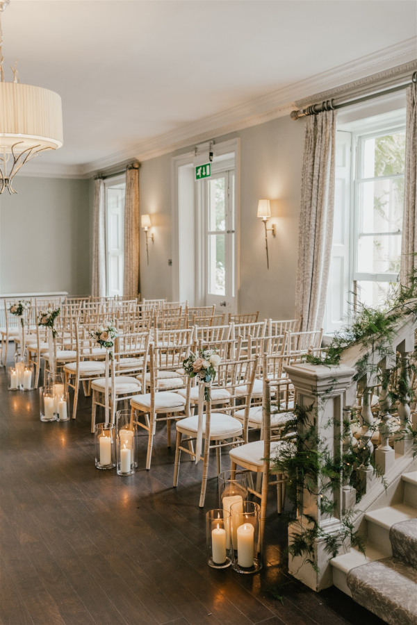 Lantern lined wedding aisle at Morden Hall