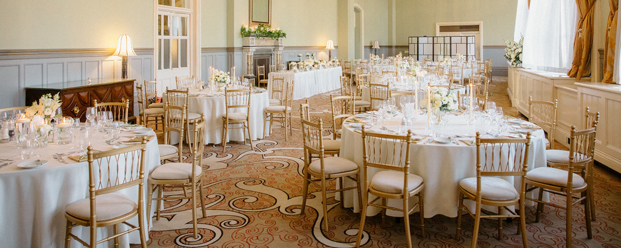 Wedding reception sage green and gold accents, Ladies Smoking Room St Pancras London Hotel