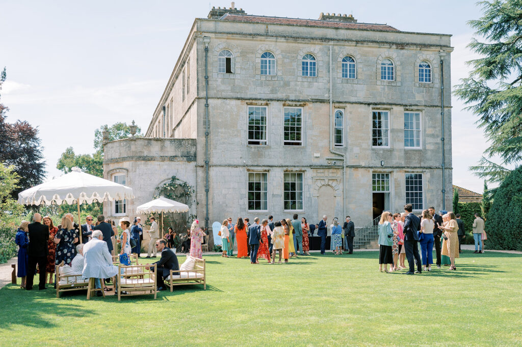 Outdoor drinks reception at Elmore Court Gloucester with outdoor furniture