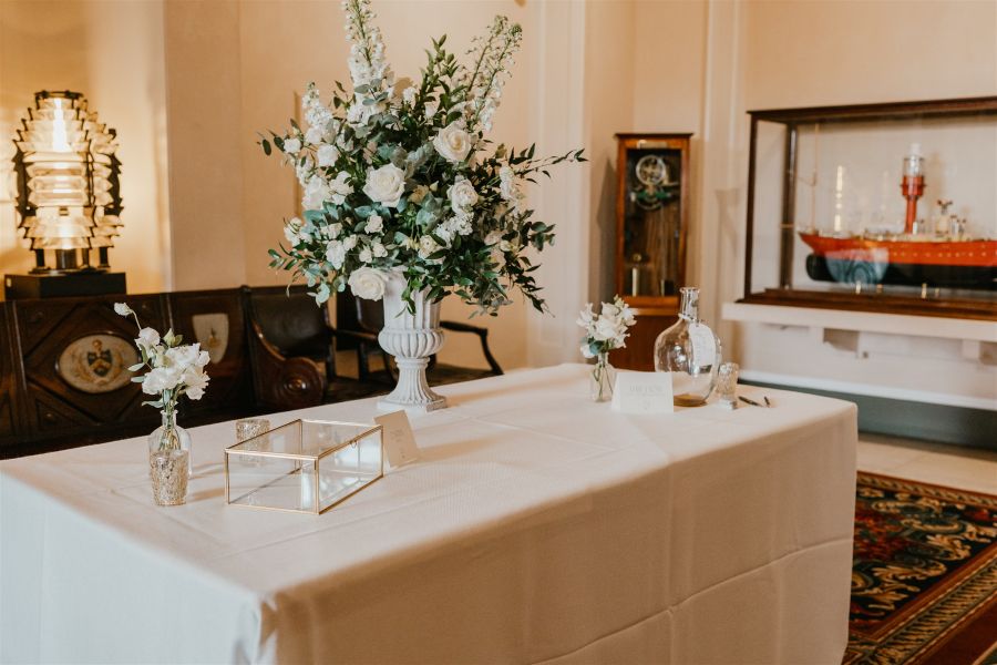 Gift table with white flower arrangement Trinity House