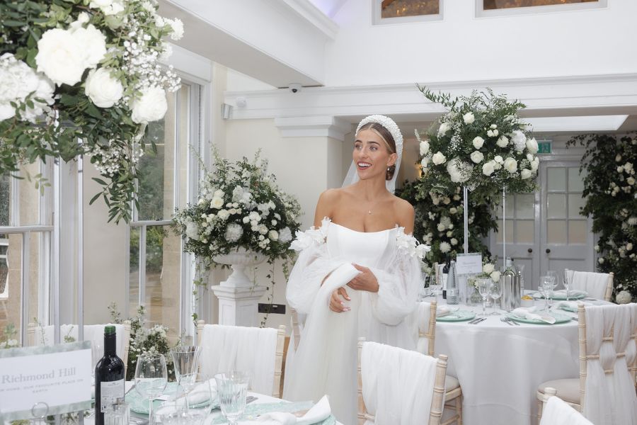 Pembroke Lodge wedding reception with bride and tablescapes