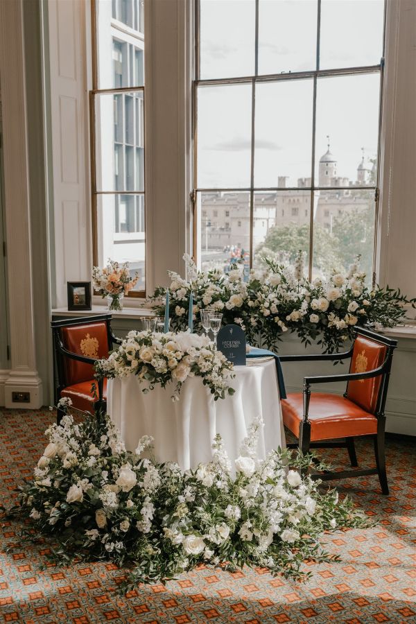 Sweetheart table with floral installations Trinity House