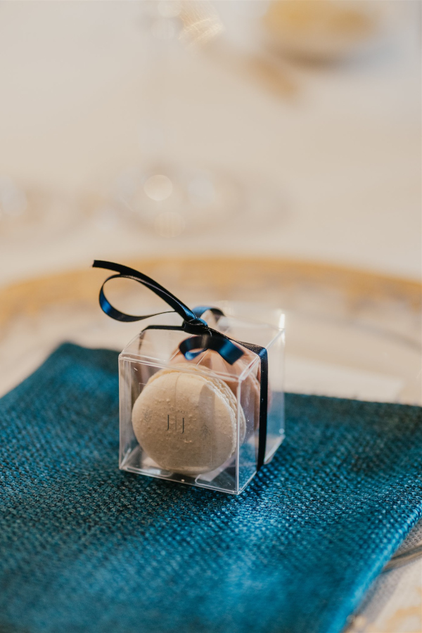 Personalised macarons with navy blue ribbon