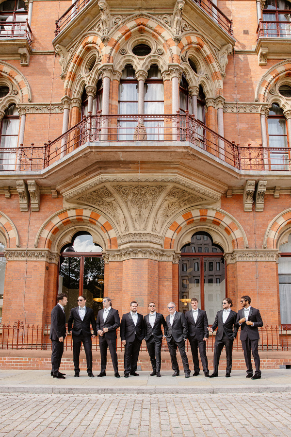 Grooms party outside st plancras hotel london