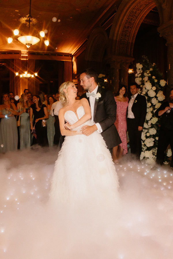 Couple first dance with smoke and bubbles St Pancras London